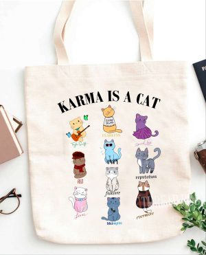 Karma is a cat tote bag